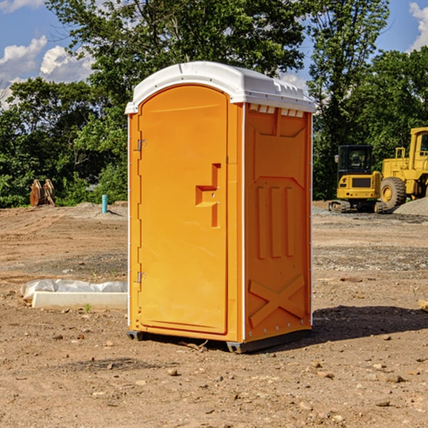 what is the cost difference between standard and deluxe portable restroom rentals in Merna